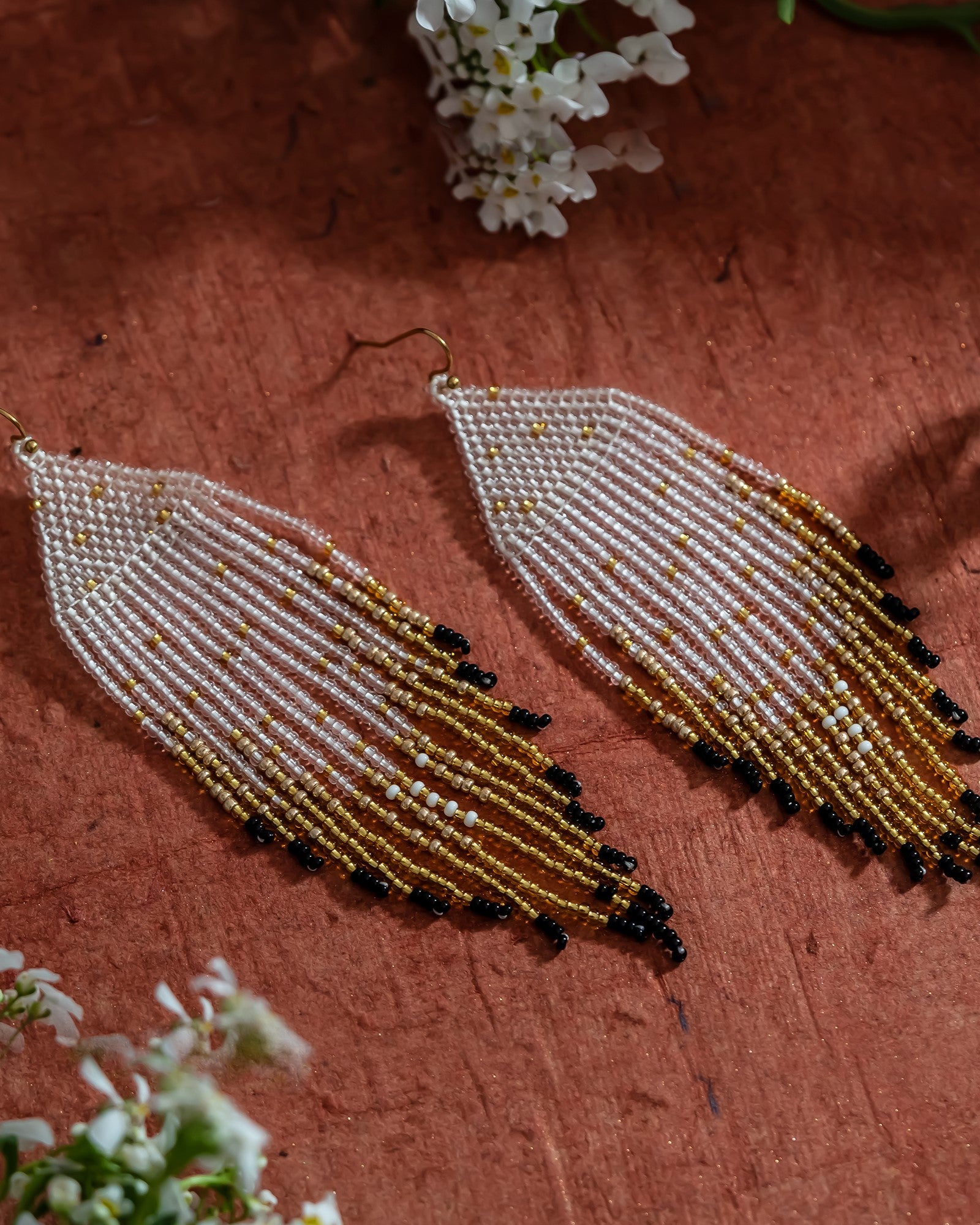 Aashve beaded earrings styled with jeans and a top – handmade artisan earrings by Jenni and Janki for a chic casual look